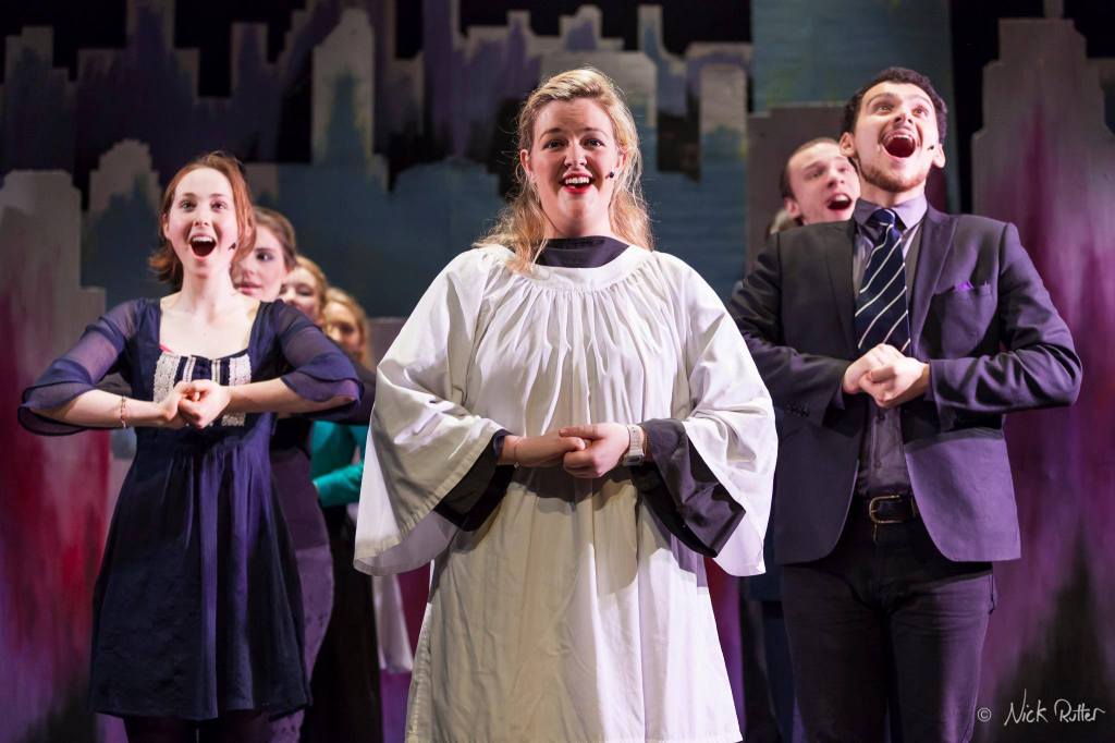Before she was a nurse, Miss Mustardseed enjoyed performing as part of university theatre groups. In this image, she can be seen singing in a production of Company on the ADC Theatre stage.
