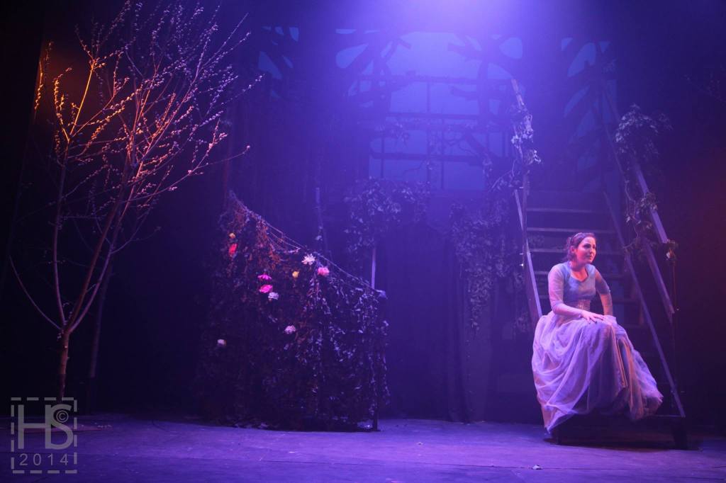 Before she was a nurse, Miss Mustardseed enjoyed performing as part of university theatre groups. In this image, she can be seen sitting on some stairs at the side of the ADC Theatre stage, dressed as Cinderella in a CUMTS production of Into The Woods.
